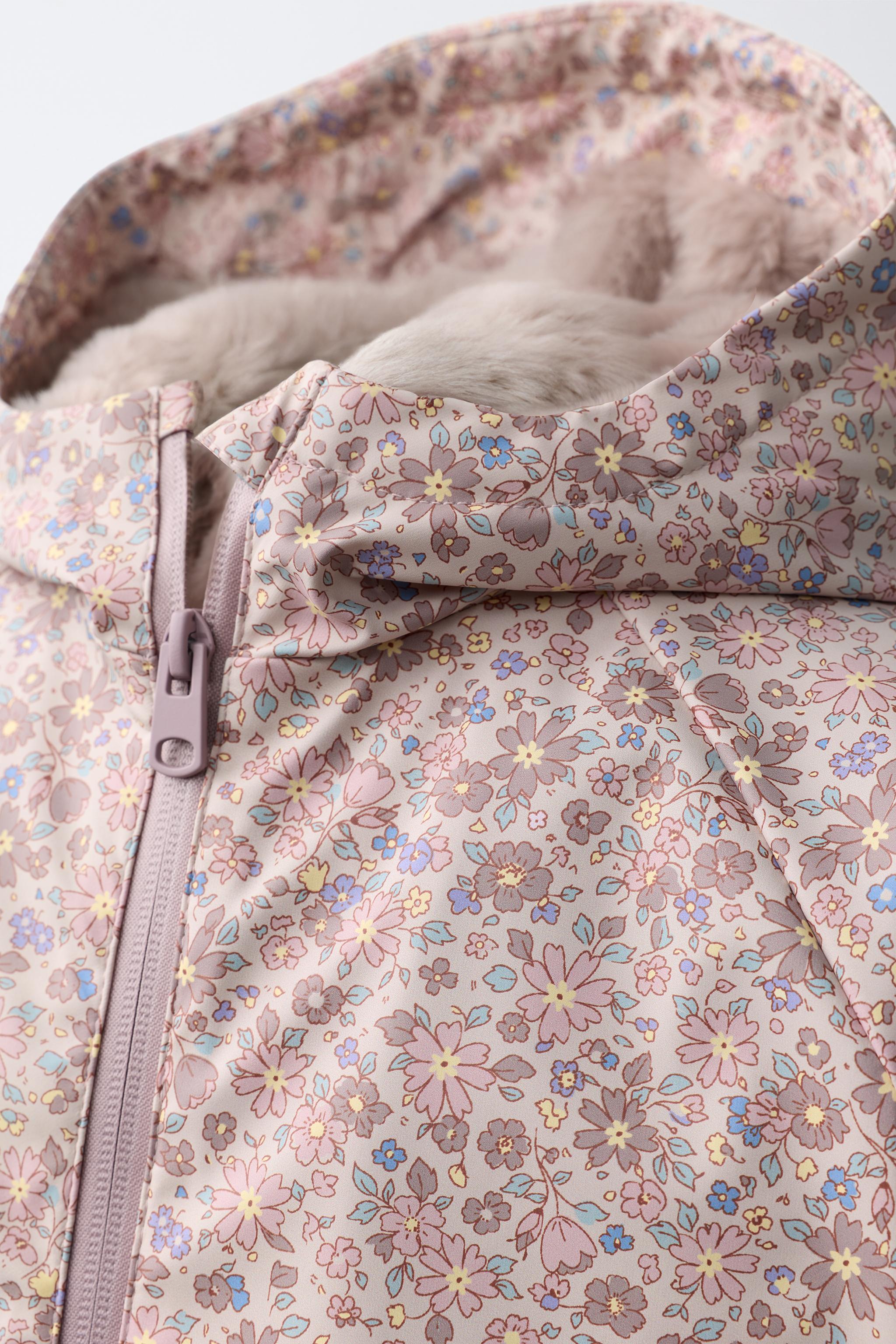 WATER-REPELLENT RUBBERIZED FLORAL RAINCOAT